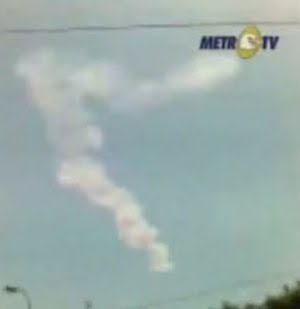 [Remains of an asteroid explosion over Indonesia. Image credit: NASA/Metro TV. From: http://www.msnbc.msn.com/id/33540411/ns/technology_and_science-space/]